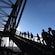Guests walking up stairs on the Sydney Harbour Bridge